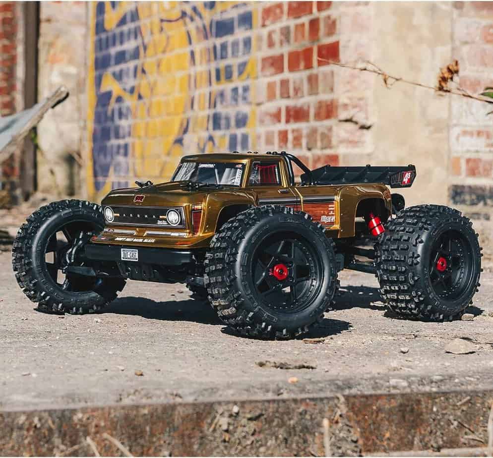 ARRMA RC Truck 1/10 Outcast 4X4 4S V2 BLX Stunt Truck RTR (Battery and Charger Not Included), Bronze, ARA4410V2T1